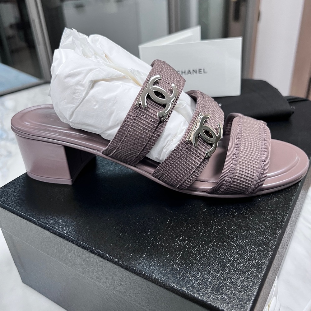 Brand new, never worn Chanel Sandals. This color is not available in the USA.